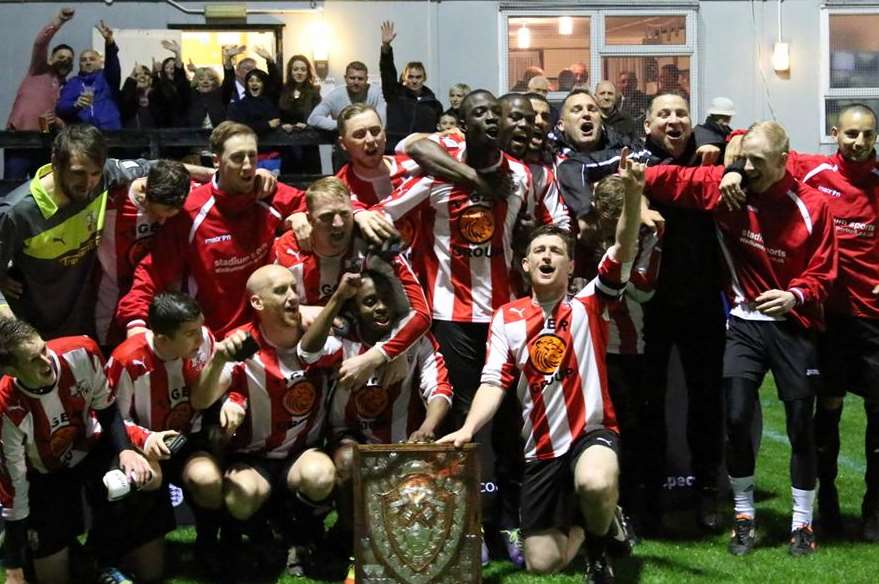 Sheppey and Sheerness celebrate their Kent Intermediate Challenge Shield win and boss Kevin Hake wants to keep the squad together for more success Picture: Steve Povey