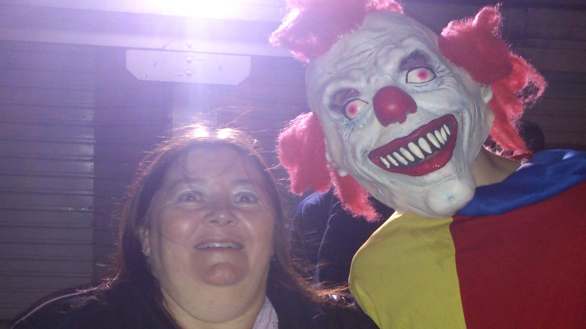 Reviewer Debbie Edwards is approached by a menacing clown at Freak Week Resurrection