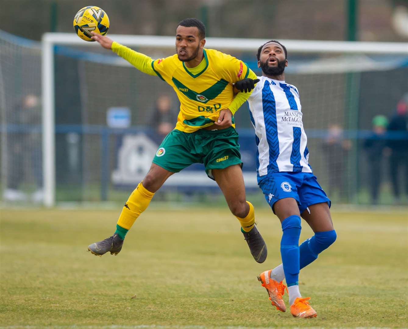 Ashford United full-back Tariq Ossai gets up well at Haywards Heath. Picture: Ian Scammell