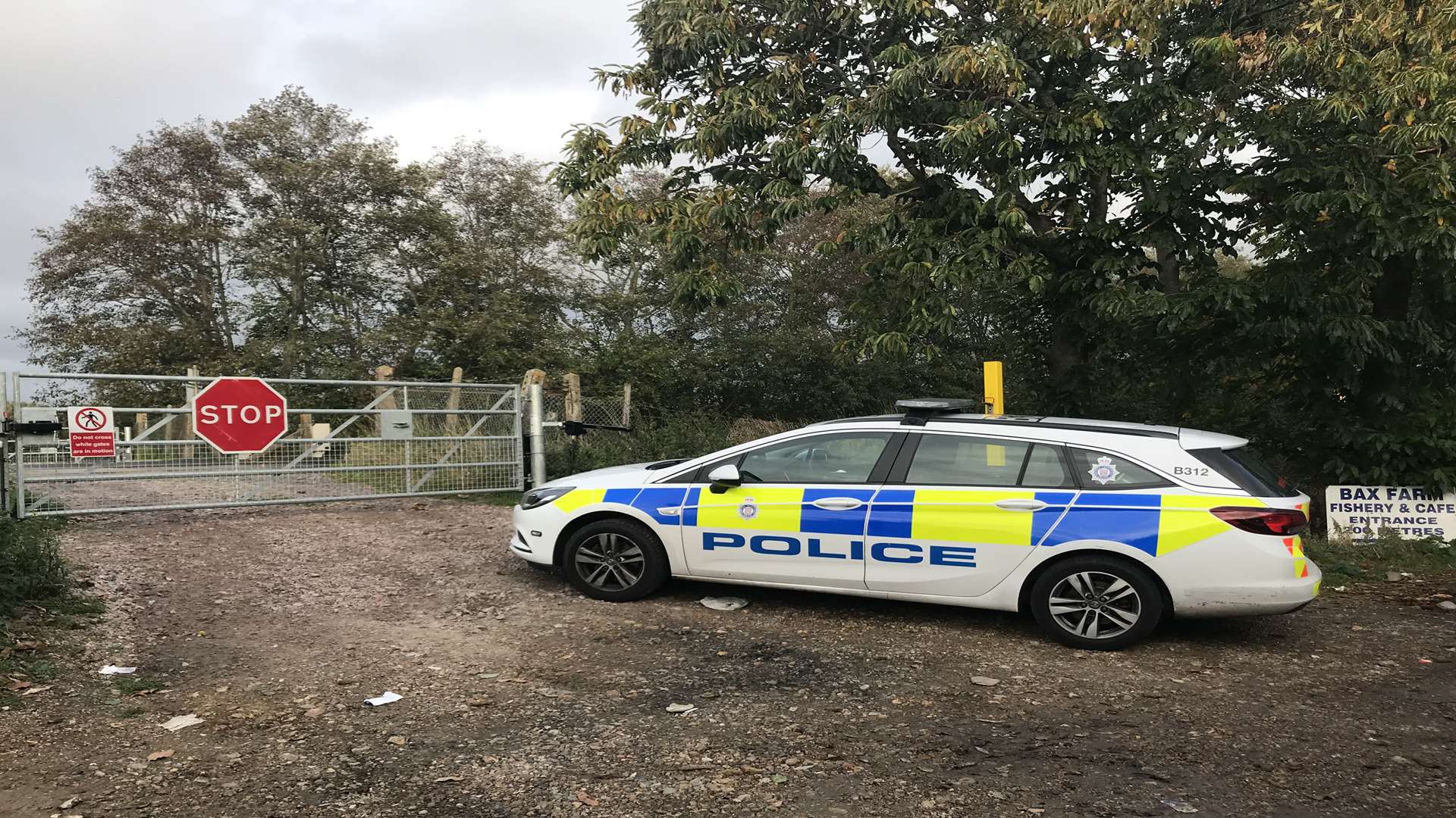 A police car by the tracks in Lower Road, Teynham, near where a train hit a van