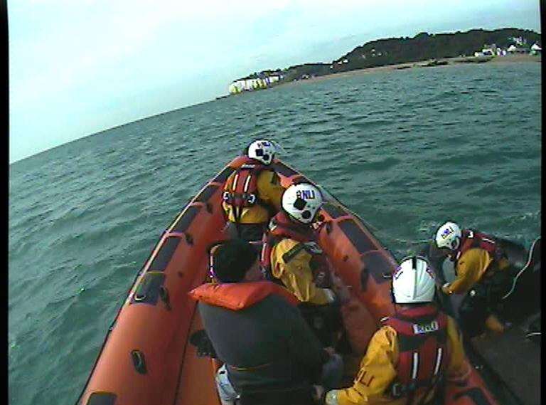 A picture from the RNLI video showing the rescue man on the lifeboat