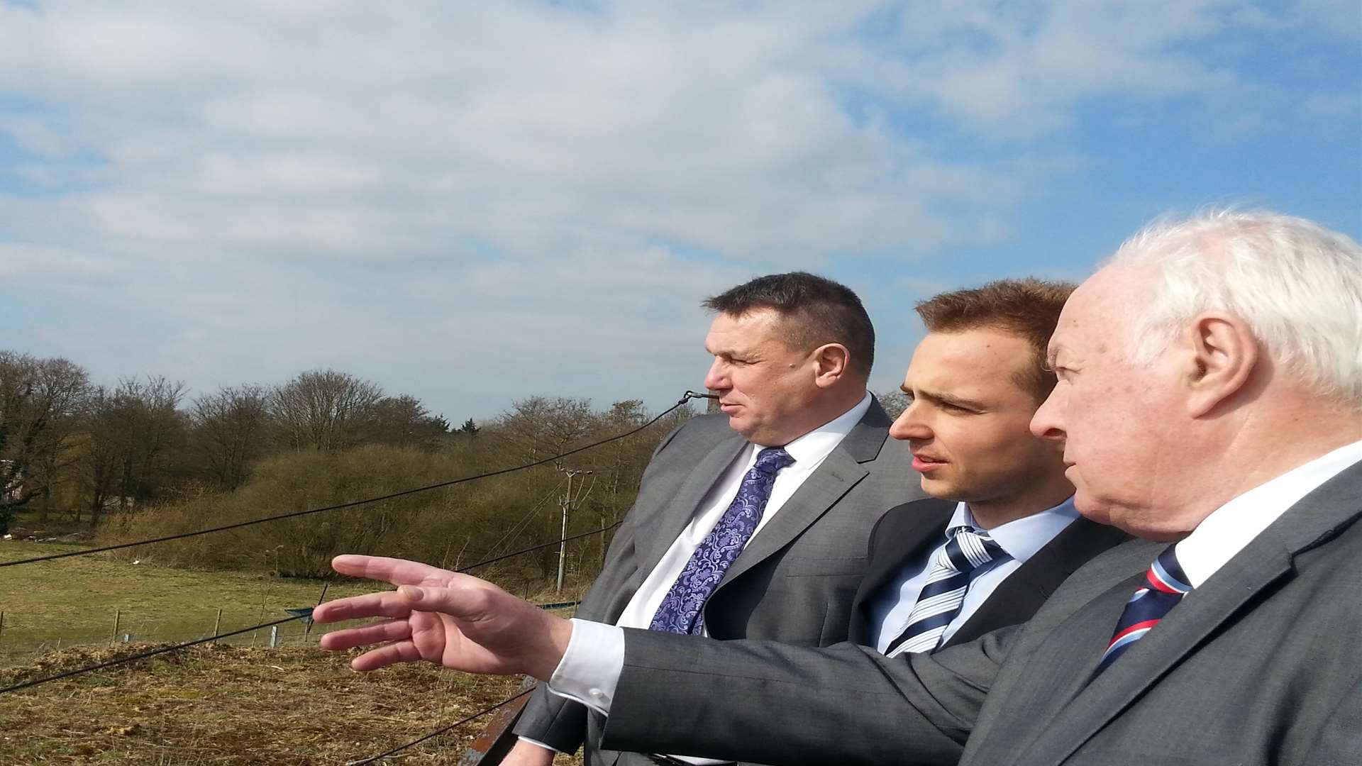 Viewing new open land for lorry parking. From left, Paul Wells, of Channel Ports Ltd, Luke Davenport of Henry Boot Developments and David Monk, leader of Shepway District Council.
