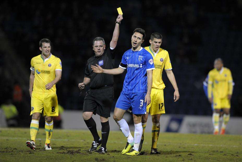 Joe Martin goes into the referee's notebook Picture: Barry Goodwin