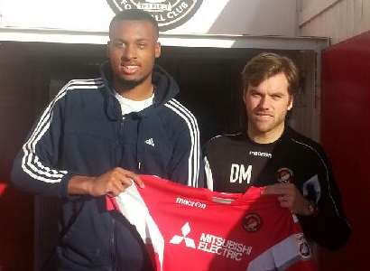 Reiss Greenidge pictured with Ebbsfleet boss Daryl McMahon after signing