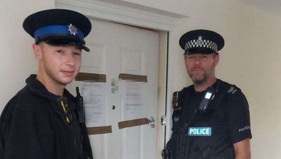 PCSO Morgan Mitchell and Sergeant Steve Holpin pictured at the address in Silver Streak Way, when it was first closed down in October last year. Photo: Kent Police