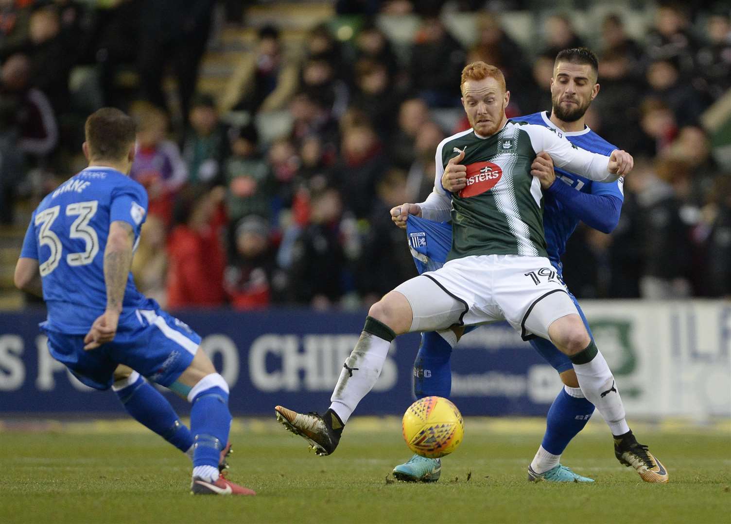 Gillingham's Max Ehmer against Plymouth's Ryan Taylor at Home Park in December Picture: Ady Kerry