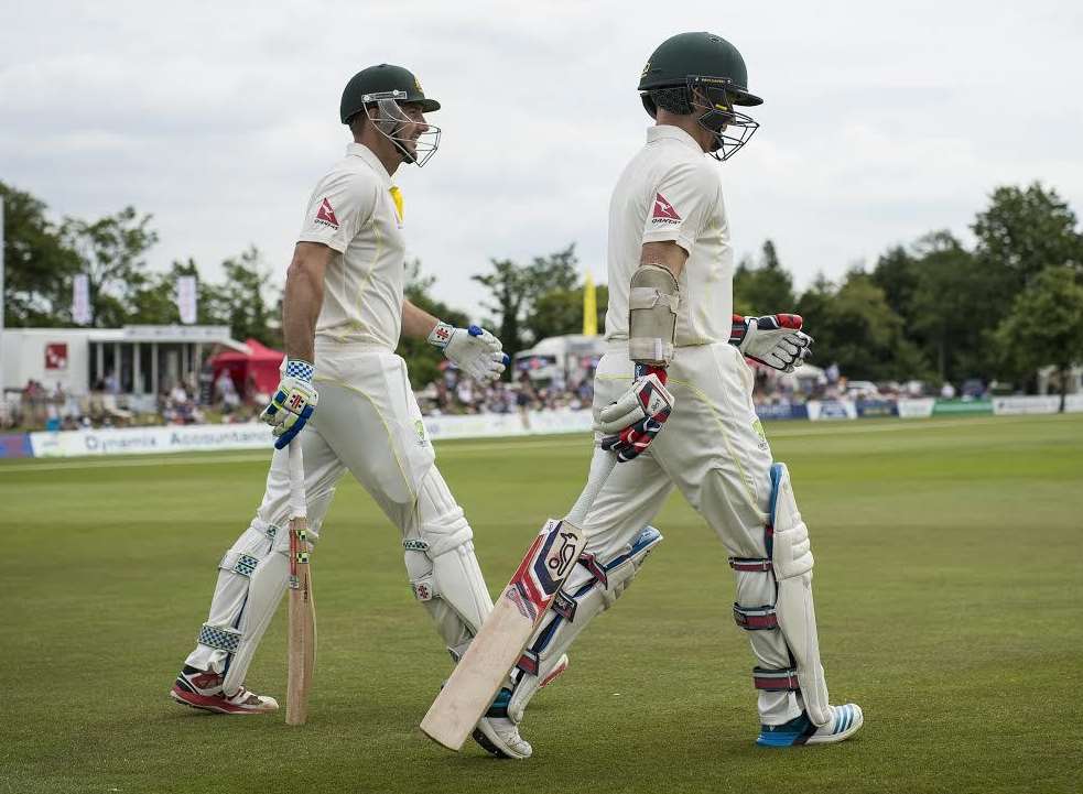 Australian openers Shaun Marsh, left, and Chris Rogers walk out to bat Picture: Ady Kerry