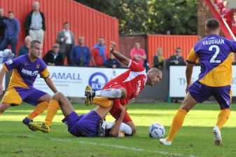 Ross Lafayette goes down under the challenge of Josh Gowling in the second half Picture: Keith Gillard