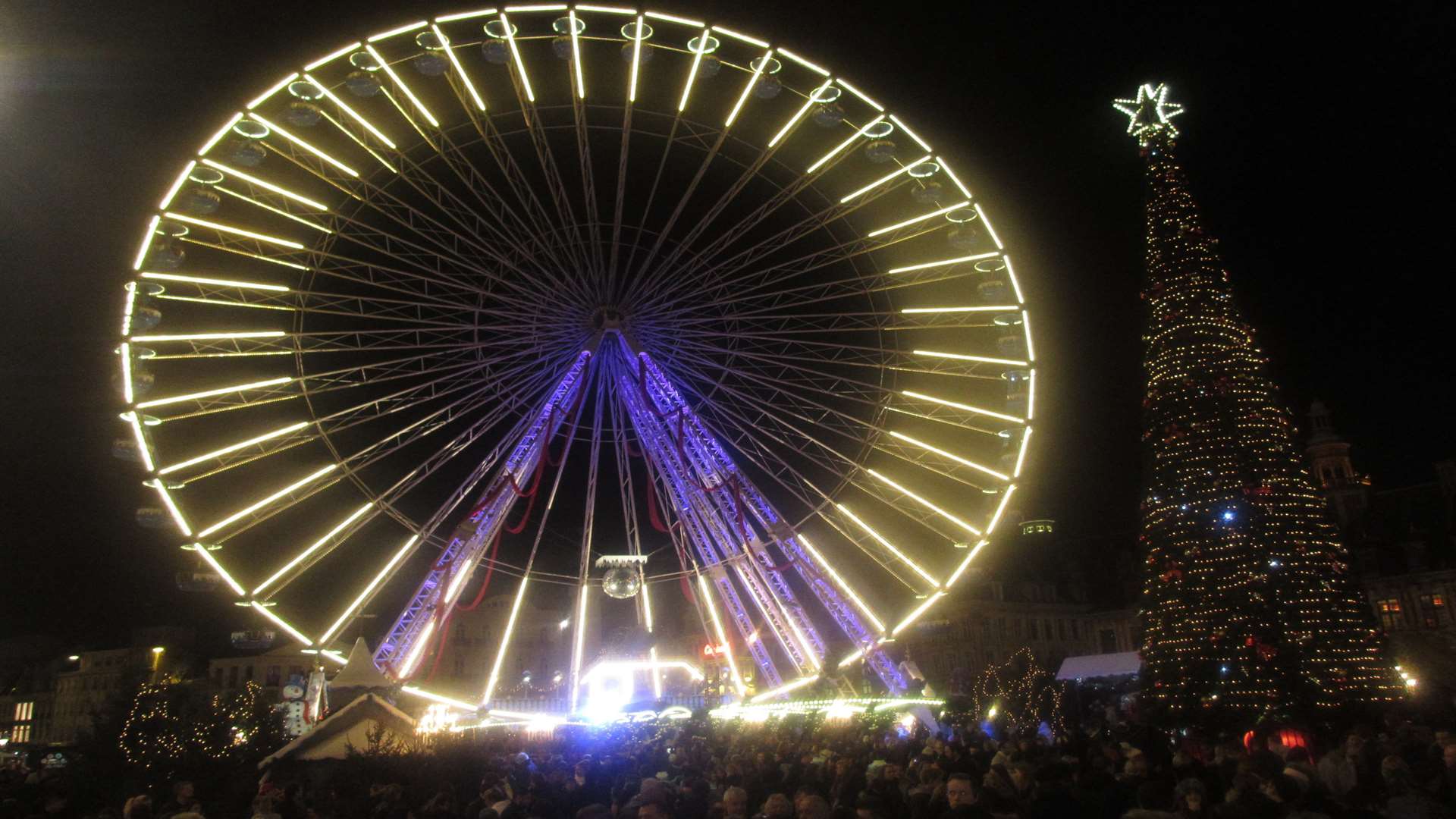 The impressive 50 metre high big wheel turns majestically above the Grand’Place. Picture: Mike Rees