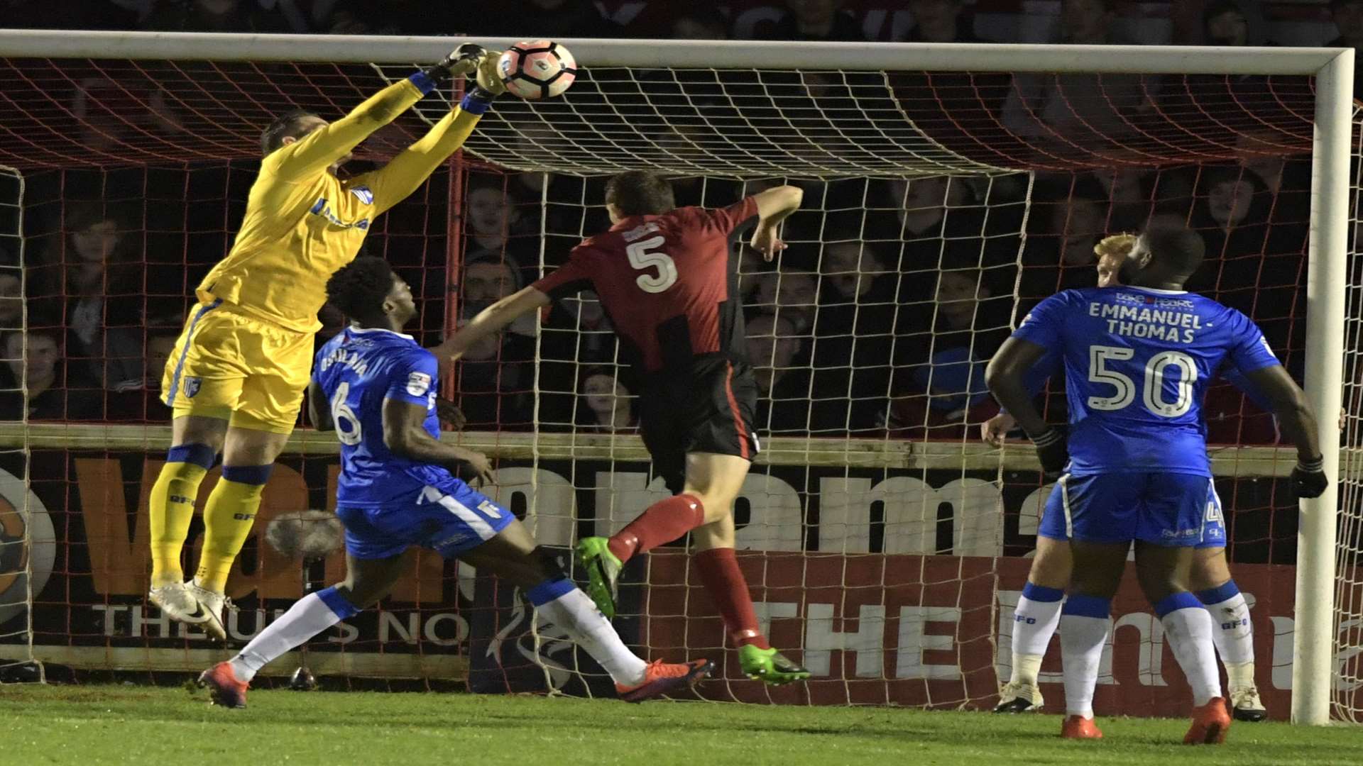 Stuart Nelson is called into action to deny Brackley Picture: Barry Goodwin