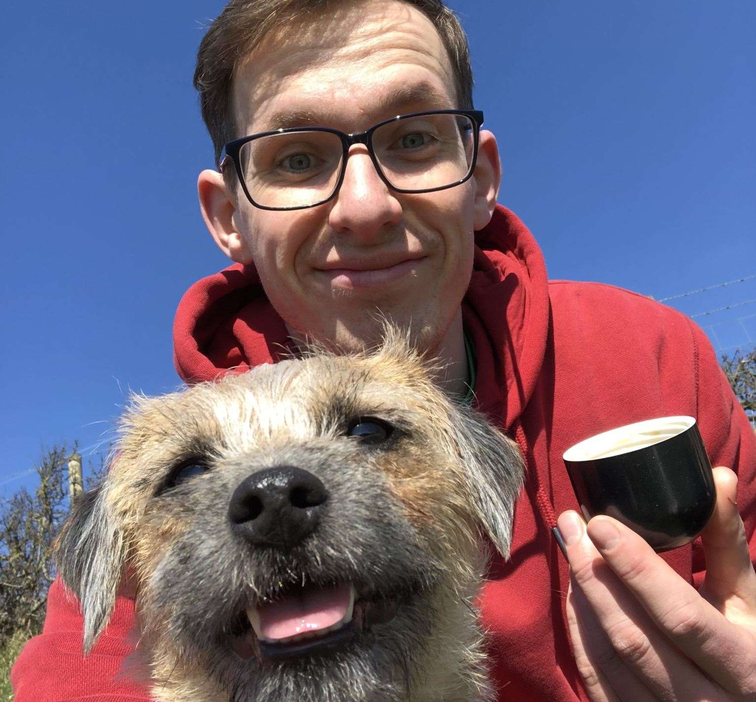 Border Terrier Millie needed emergency treatment after eating a mouldy sausage. With owner Jakub Ovecka. All photos: Vets Now