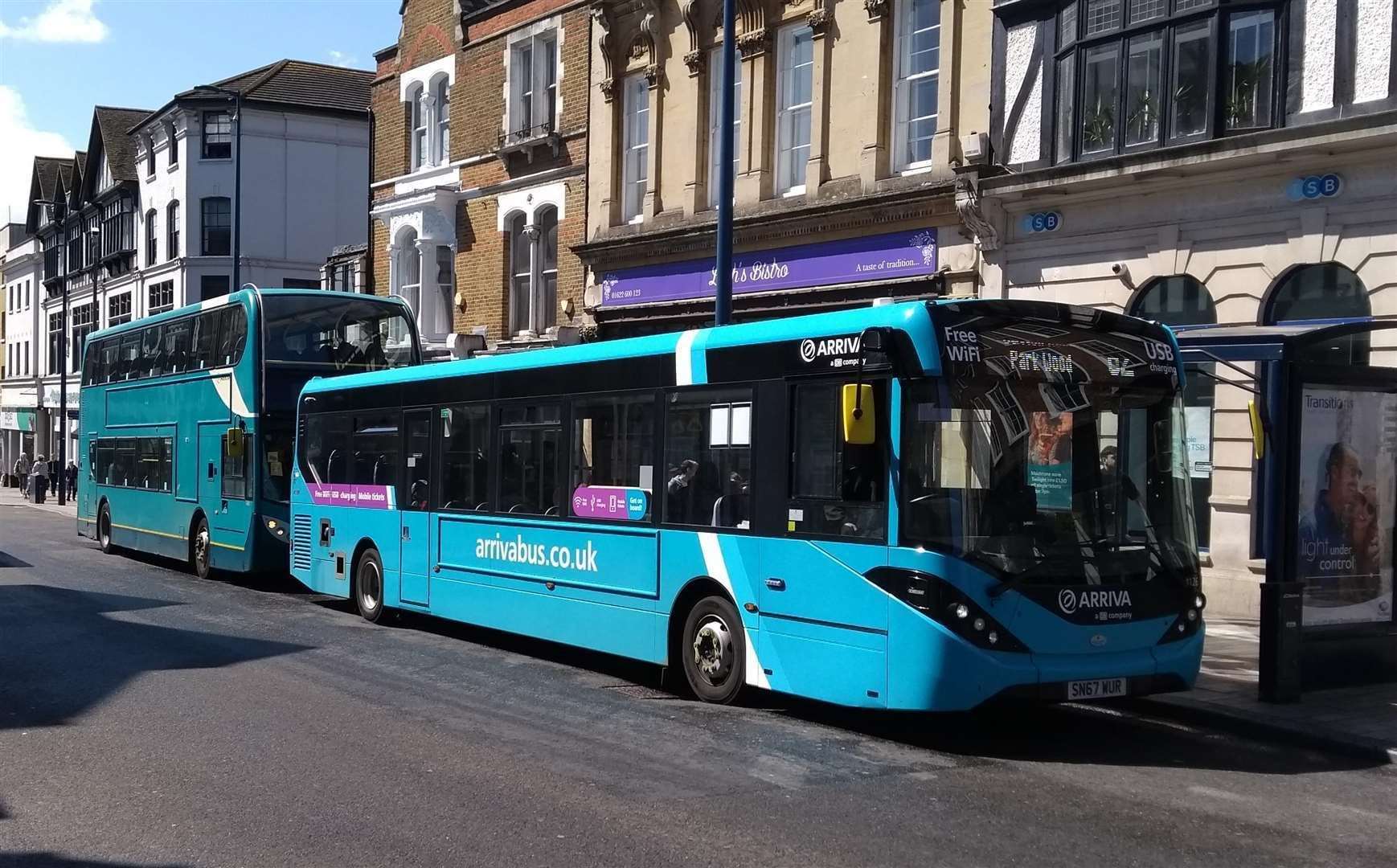 Buses sitting along Maidstone High Street