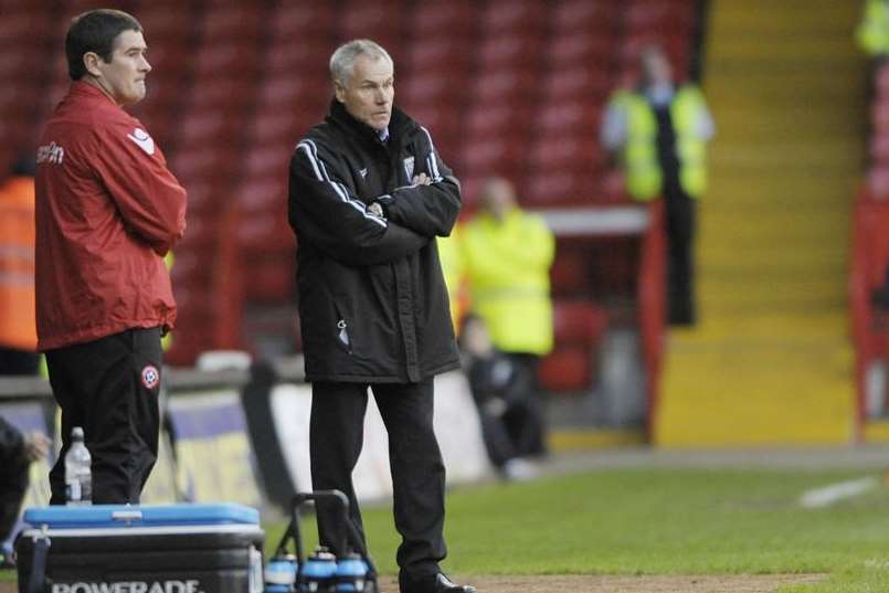 Gillingham manager Peter Taylor beside Sheffield United's Nigel Clough at Bramall Lane earlier this season. Picture: Barry Goodwin