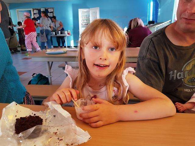 Chloe Pyke, from Cliftonville Primary School eating ice cream. Picture: Caitlin Webb (3372339)