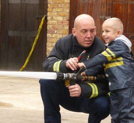 Daniel Quinn, whose dream was to meet Fireman Sam, at Clerkenwell Fire Station.