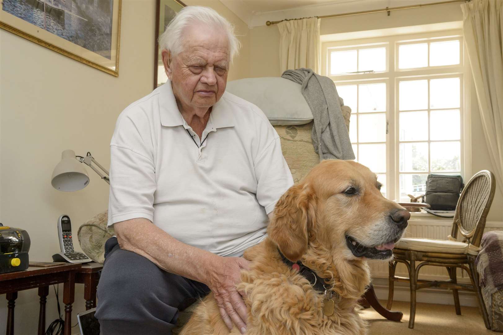 Derek Beal, of Odiham Drive, Allington, Maqidstone, and his former guide dog Paddy. Picture: Andy Payton