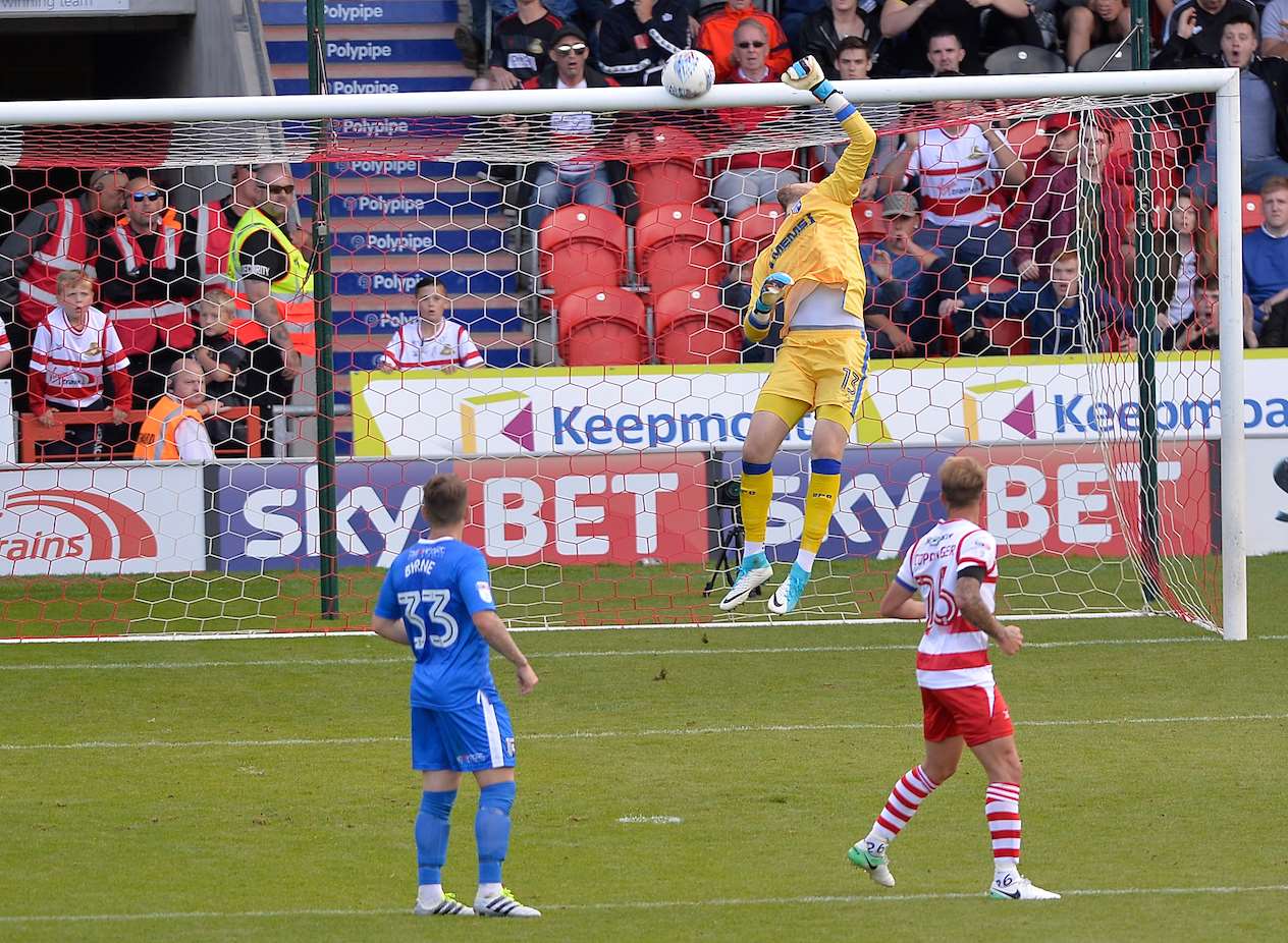 Ben Whiteman beats Gills keeper Tomas Holy but not the woodwork Picture: Ady Kerry