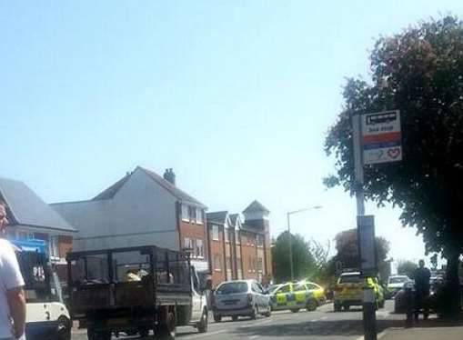 The armed police in High Street, Cheriton, earlier today. Picture: @Kent_999s