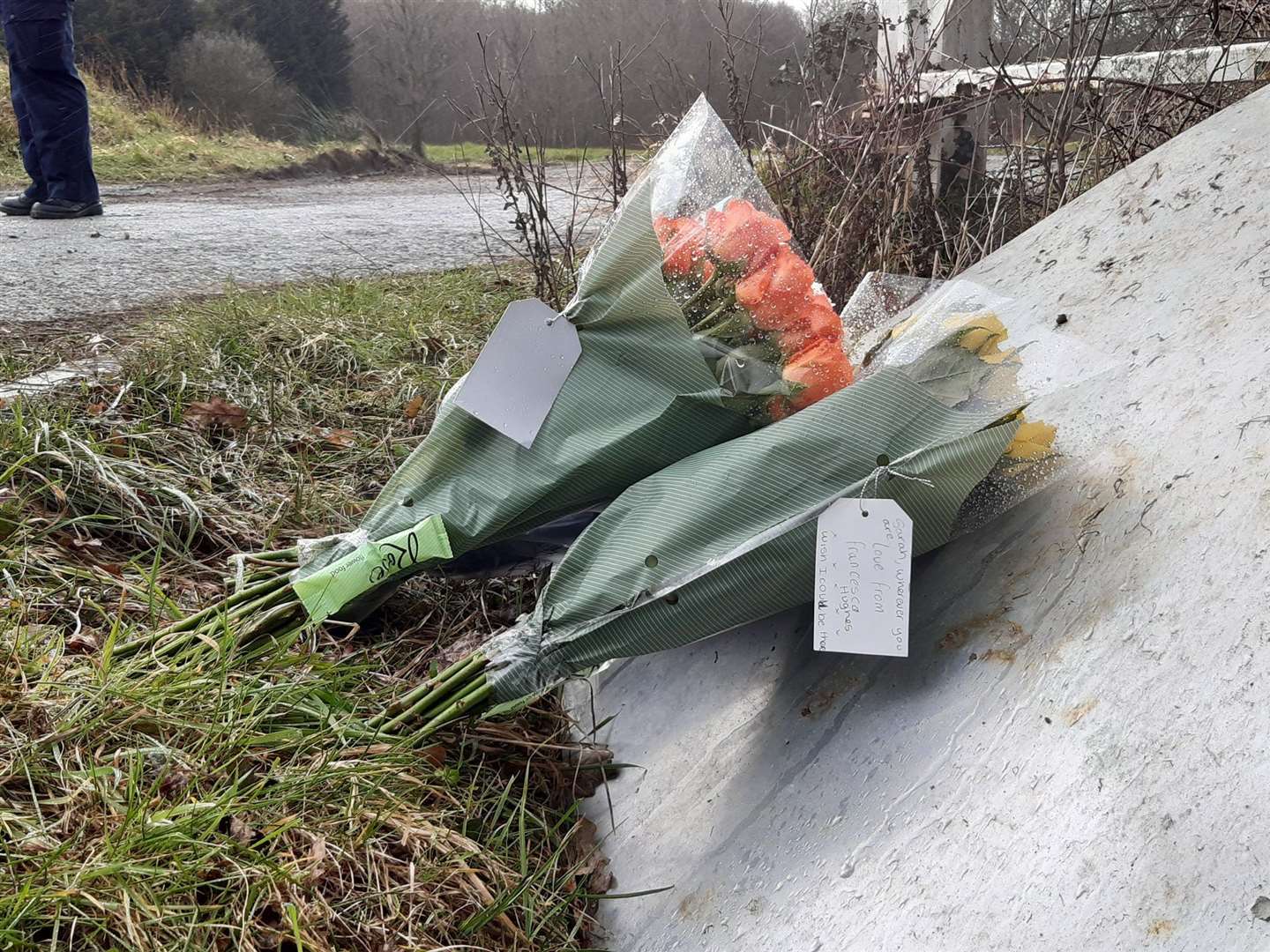 Flowers laid at the site where human remains were found in the search for Sarah Everard