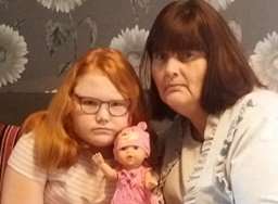 Abbie and her mum Sara were shocked by the doll's choice of words.