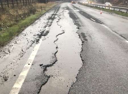 Issy Anderson was injured after crashing her car when this giant pothole opened up on the A249.