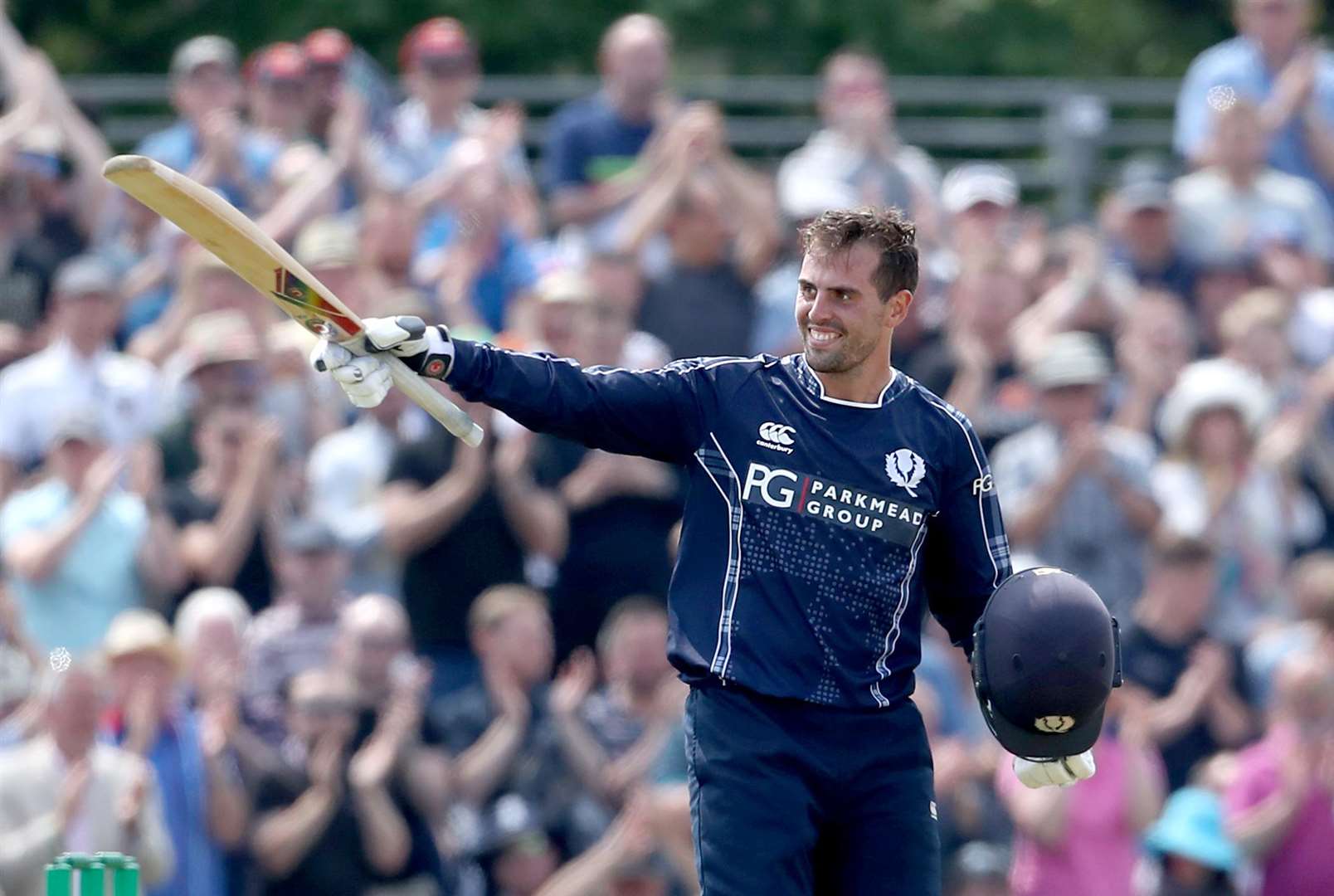 Calum MacLeod celebrates his century during the One Day International against England. Picture: Jane Barlow/PA Wire.