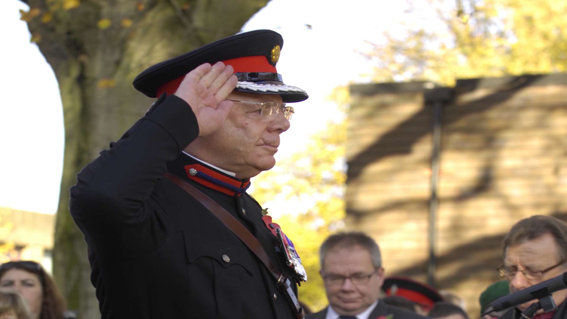 Retired Colonel Peter Bishop laying a wreath in 2012