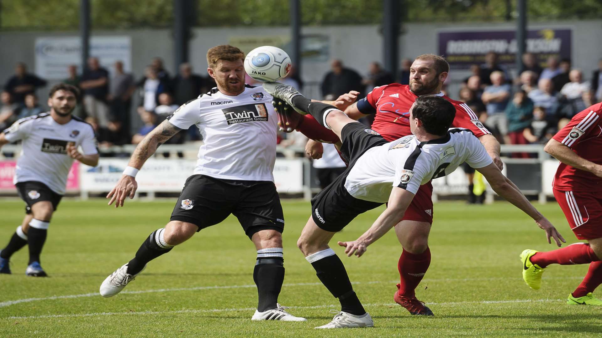 Danny Harris stretches for the ball with Elliot Bradbrook in close proximity Picture: Andy Payton