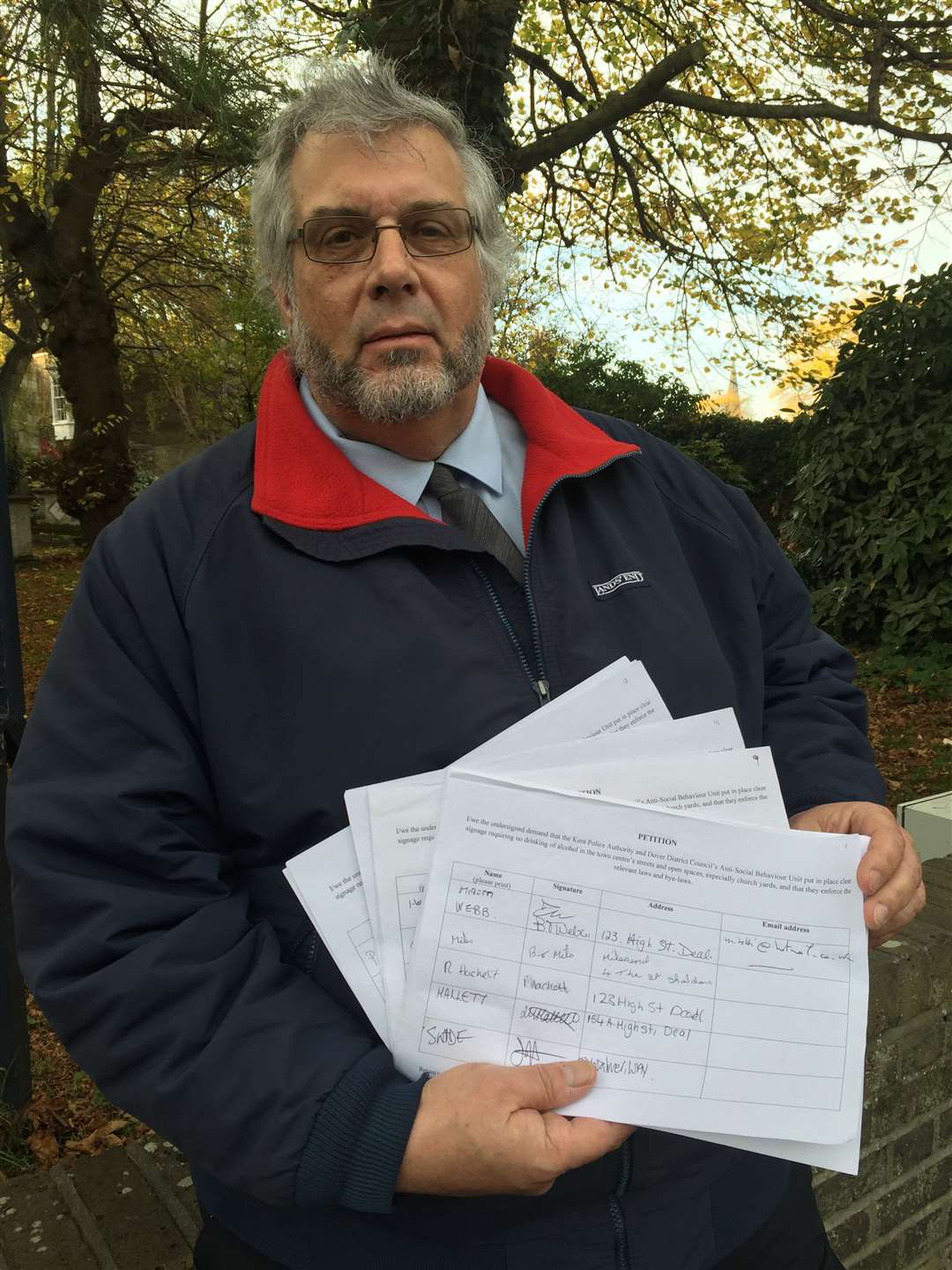 Cllr Mike Eddy with a copy of the petition