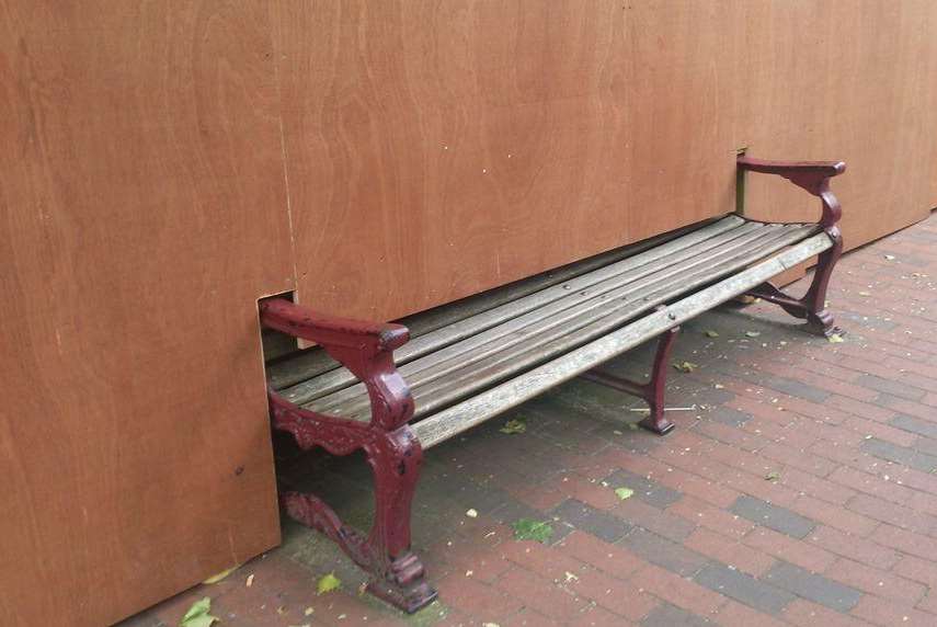 A wooden hoarding partly cuts off this bench in Tunbridge Wells. Picture: Ciara Gregory