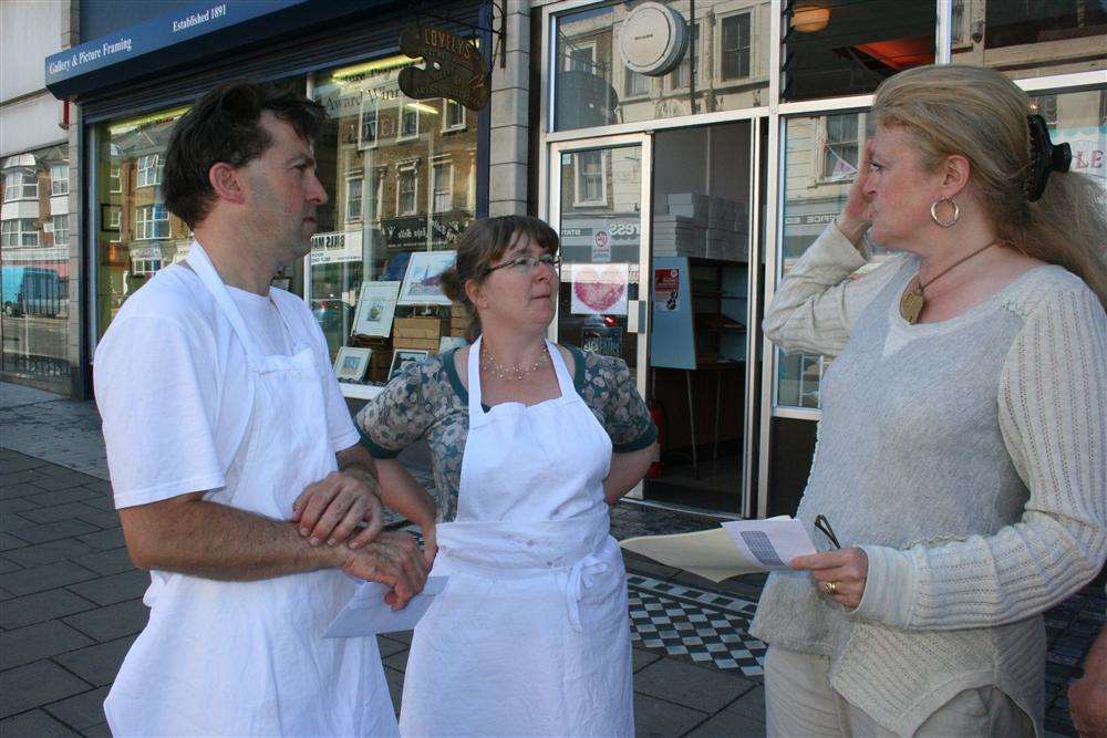 South Thanet MP Laura Sandys (right) discusses her Conserving Cliftonville's Camelot campaign as she presents a petition to Richard Veitch and Claire Musselwhite-Veitch of Batchelor's patisserie in Northdown Road