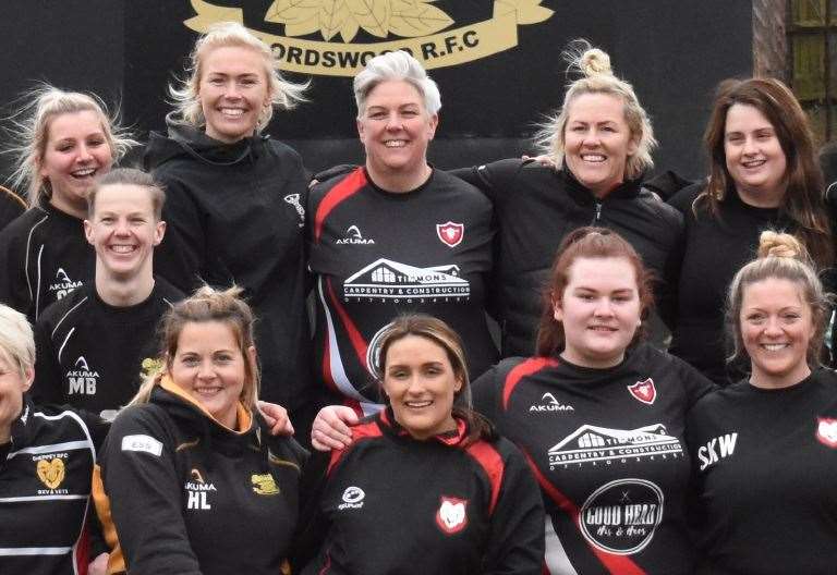 England duo Rosie Galligan and Marlie Packer (back row, seventh and ninth from left) on a previous visit to the Lordswood Valkyries last year
