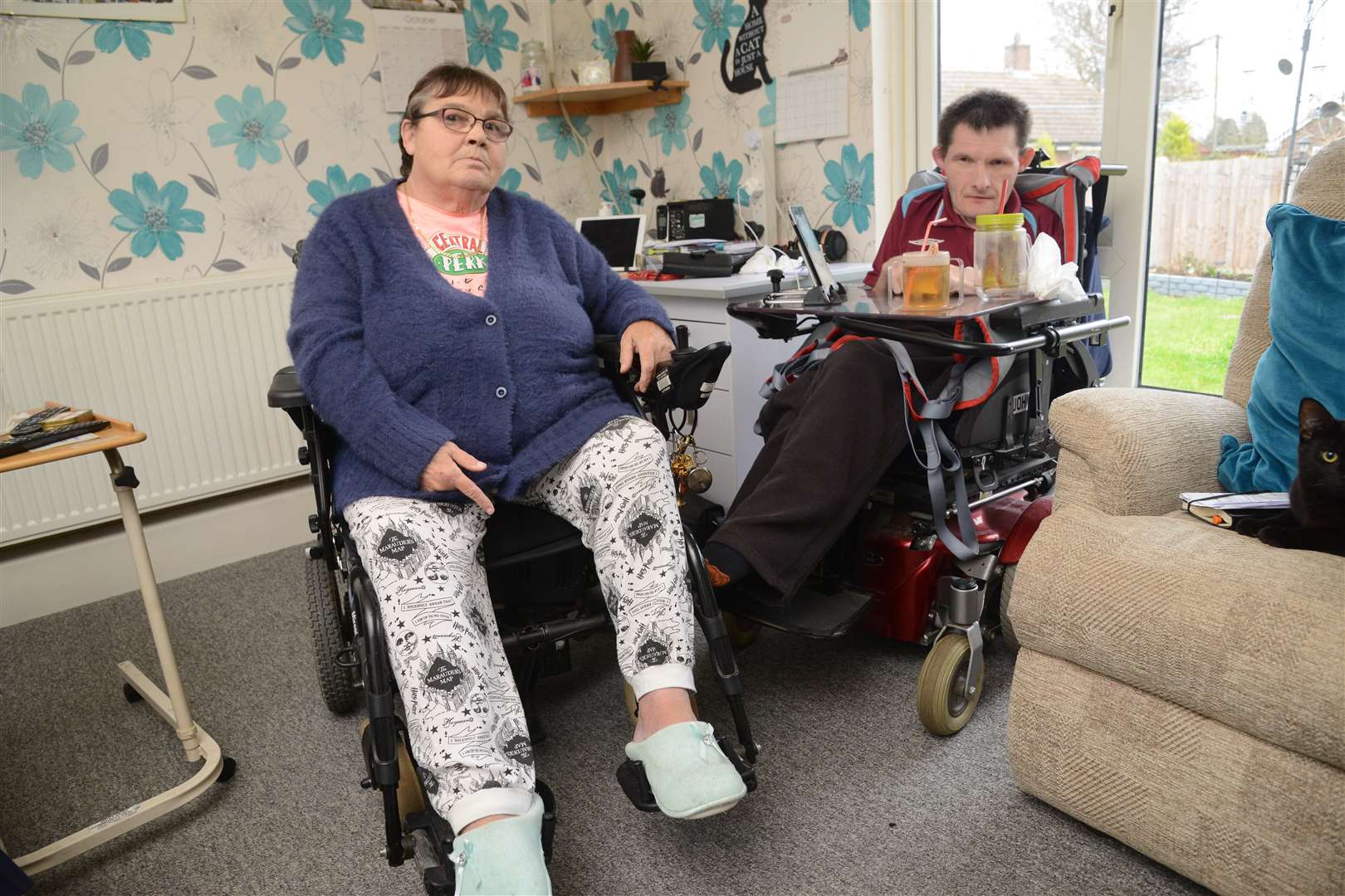 Rosemary Norris and her son John who were waiting almost a year for parts for their wheelchairs. Picture: Gary Browne