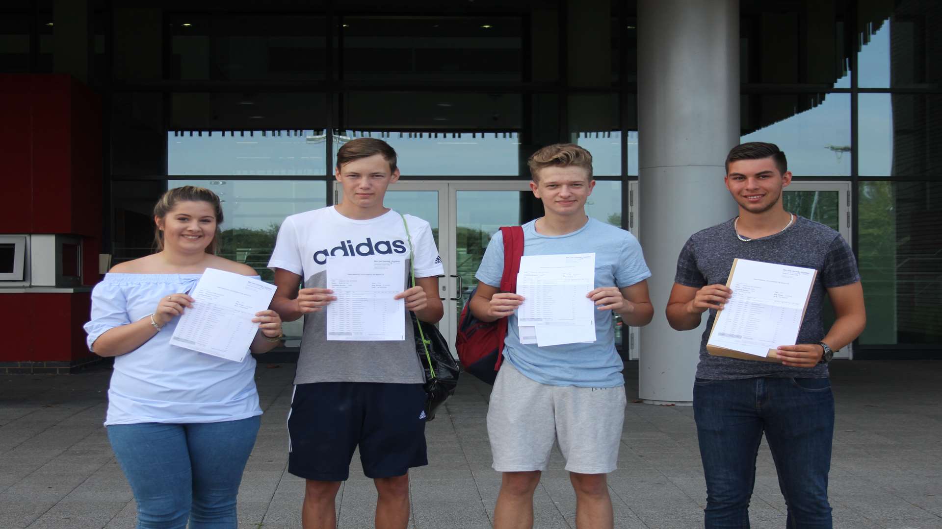 Students at New Line Learning Academy pick up their results