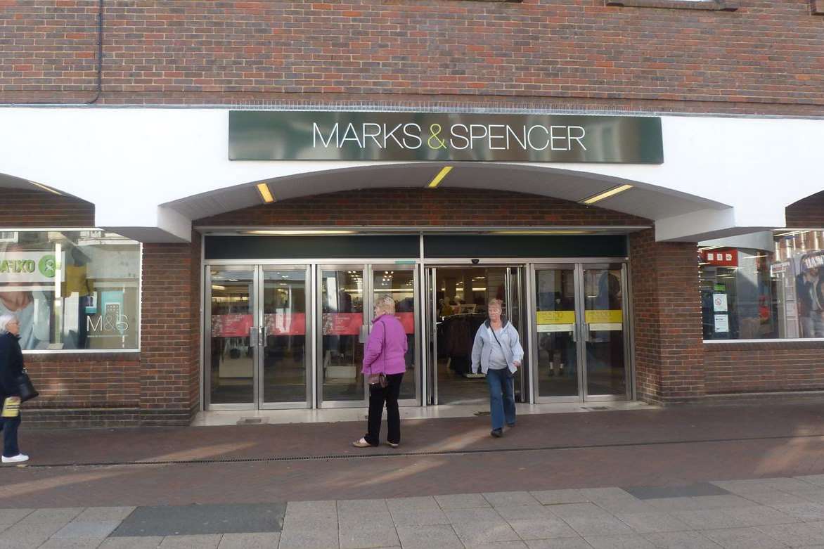 The woman became stuck in a service lift in Marks & Spencer in Ashford