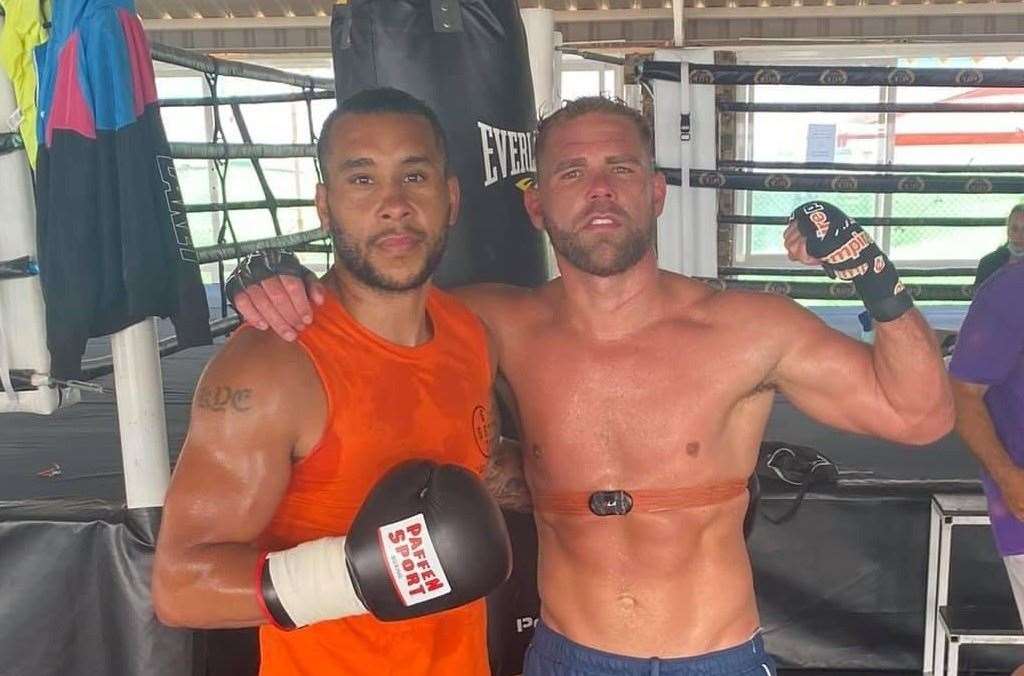 Chatham boxer Grant Dennis with two-weight world champion Billy Joe Saunders at MTK Fuerteventura