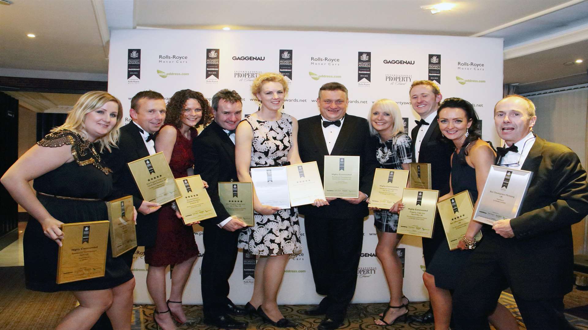 Gemma Macknelly, Sales Consultant (far left) is pictured holding the two awards received by Knights Wood, on an evening that saw Dandara triumph in 13 categories