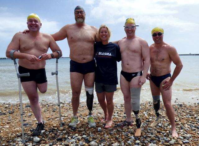 The intrepid team of former servicemen broke a world record and completed the channel swim in 12 hours and 14 minutes