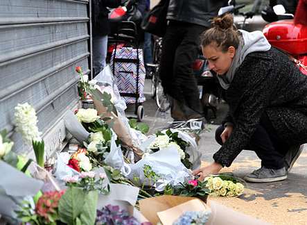 Tributes are laid in the wake of the Paris terror attacks. Picture: Kokuyo