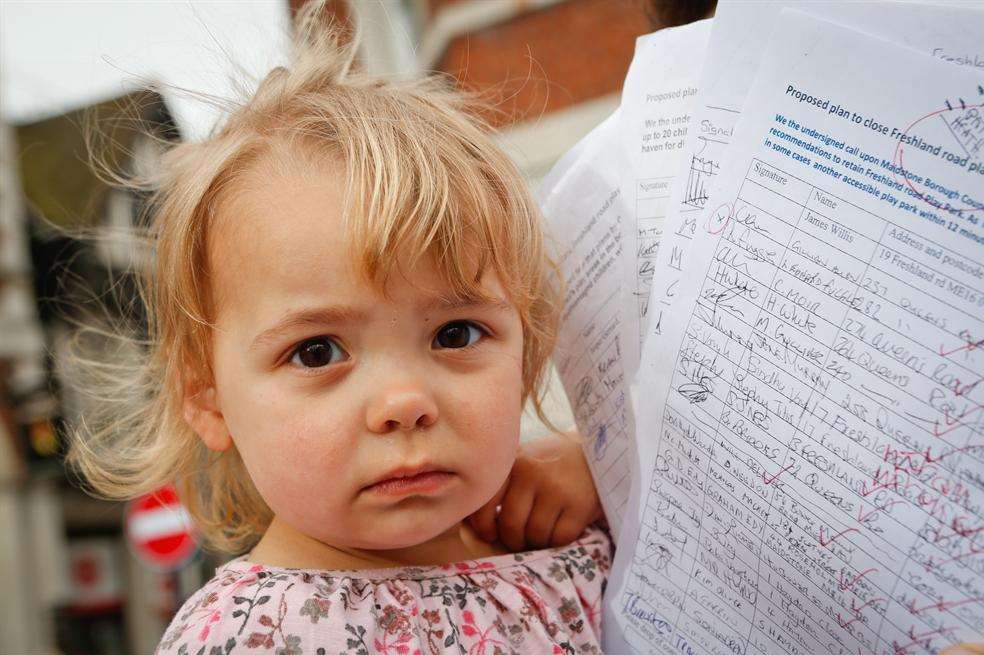 Two year old Ava Willis with the petition.
