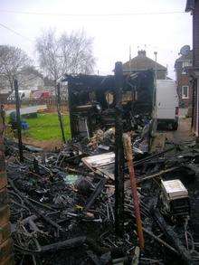 The remains after a fire at the home of Serena Morphey, 30, her partner Douglas Gould, 33 after in Queenborough