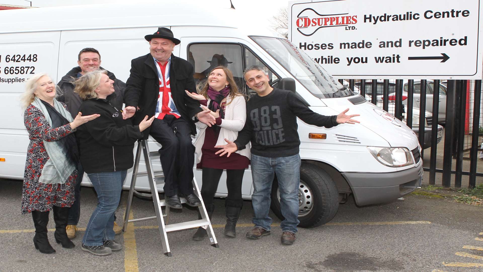 Owner Chris Driver, of CD Supplies, with family and staff