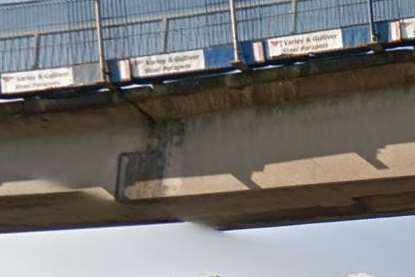 A close up of the bridge in the section where it fell apart after being hit by a lorry