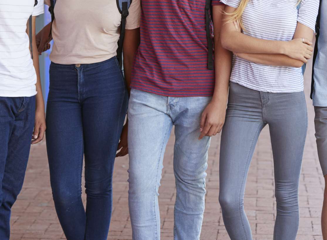 Teenagers standing in a group. Picture: Getty Images