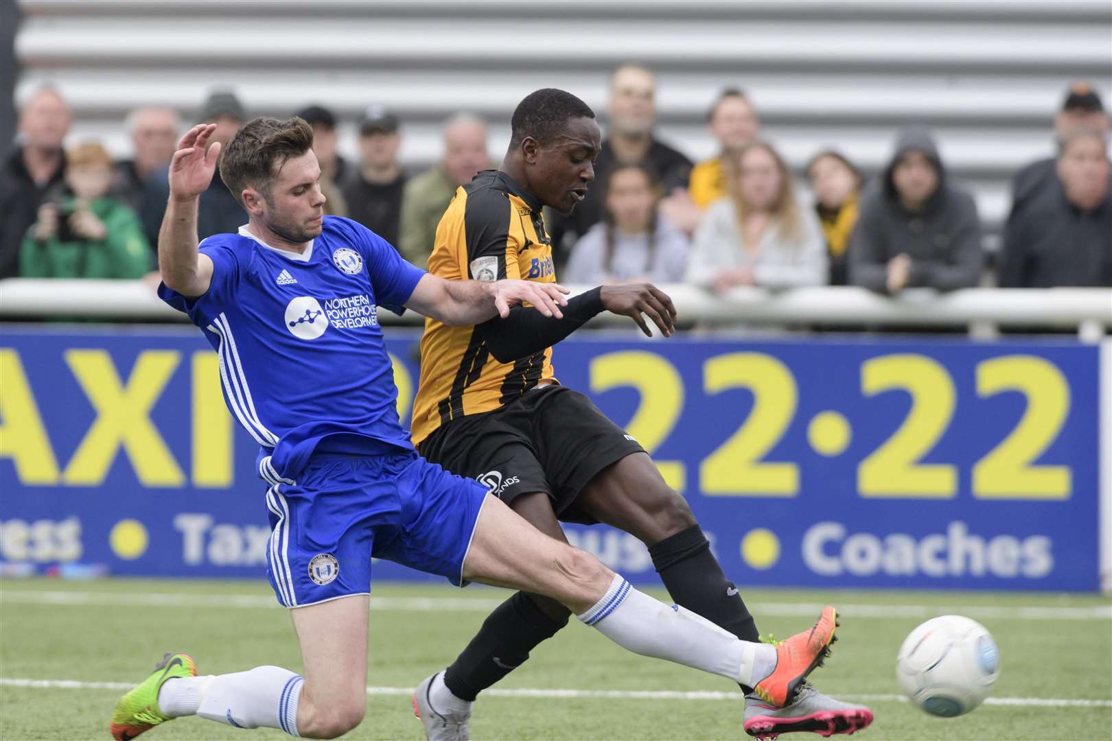Jamar Loza battles with Scott McManus as Maidstone press in the final moments of the game Picture: Andy Payton