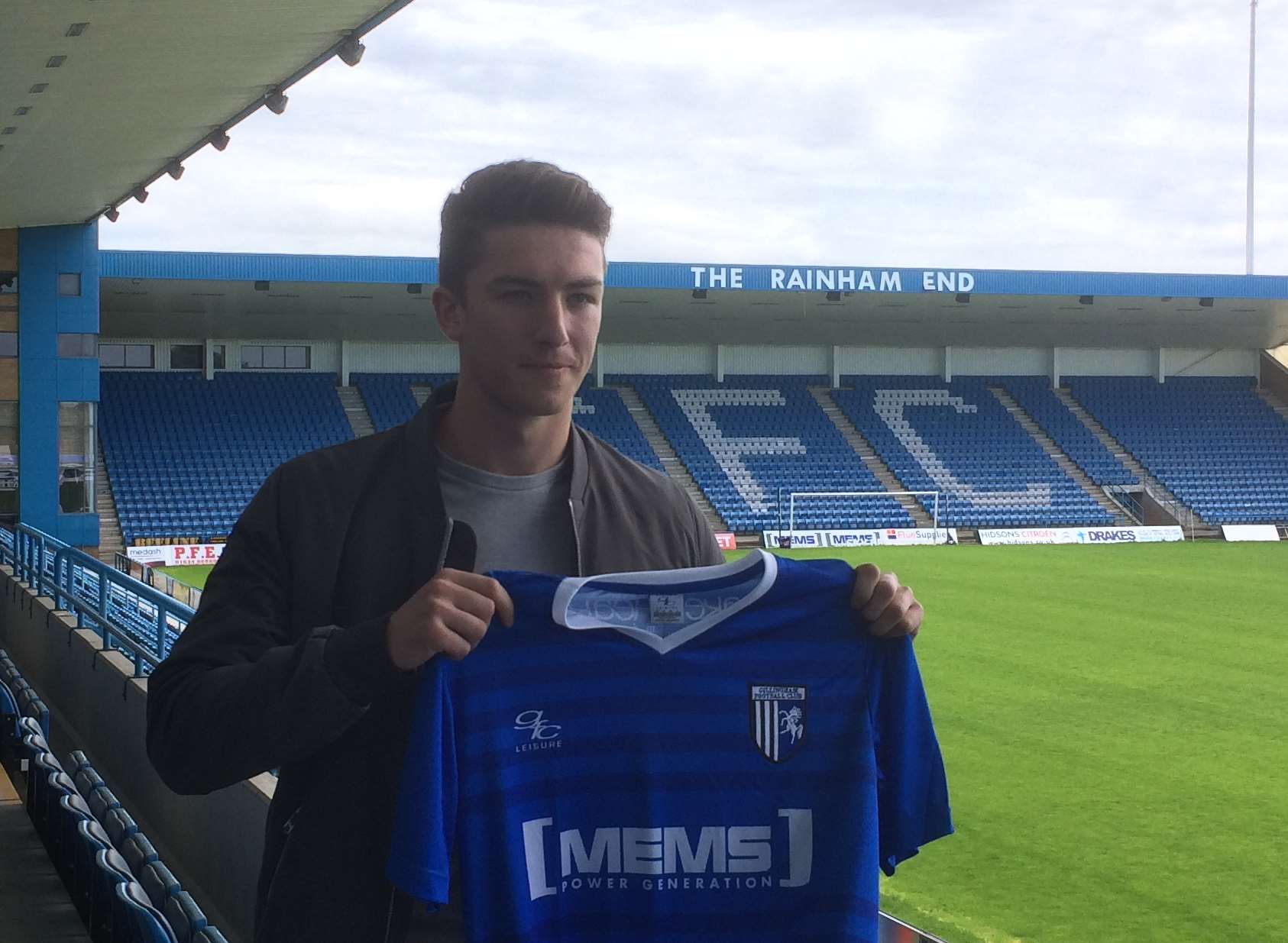 Alex Lacey signs for Gillingham Picture: KM Media