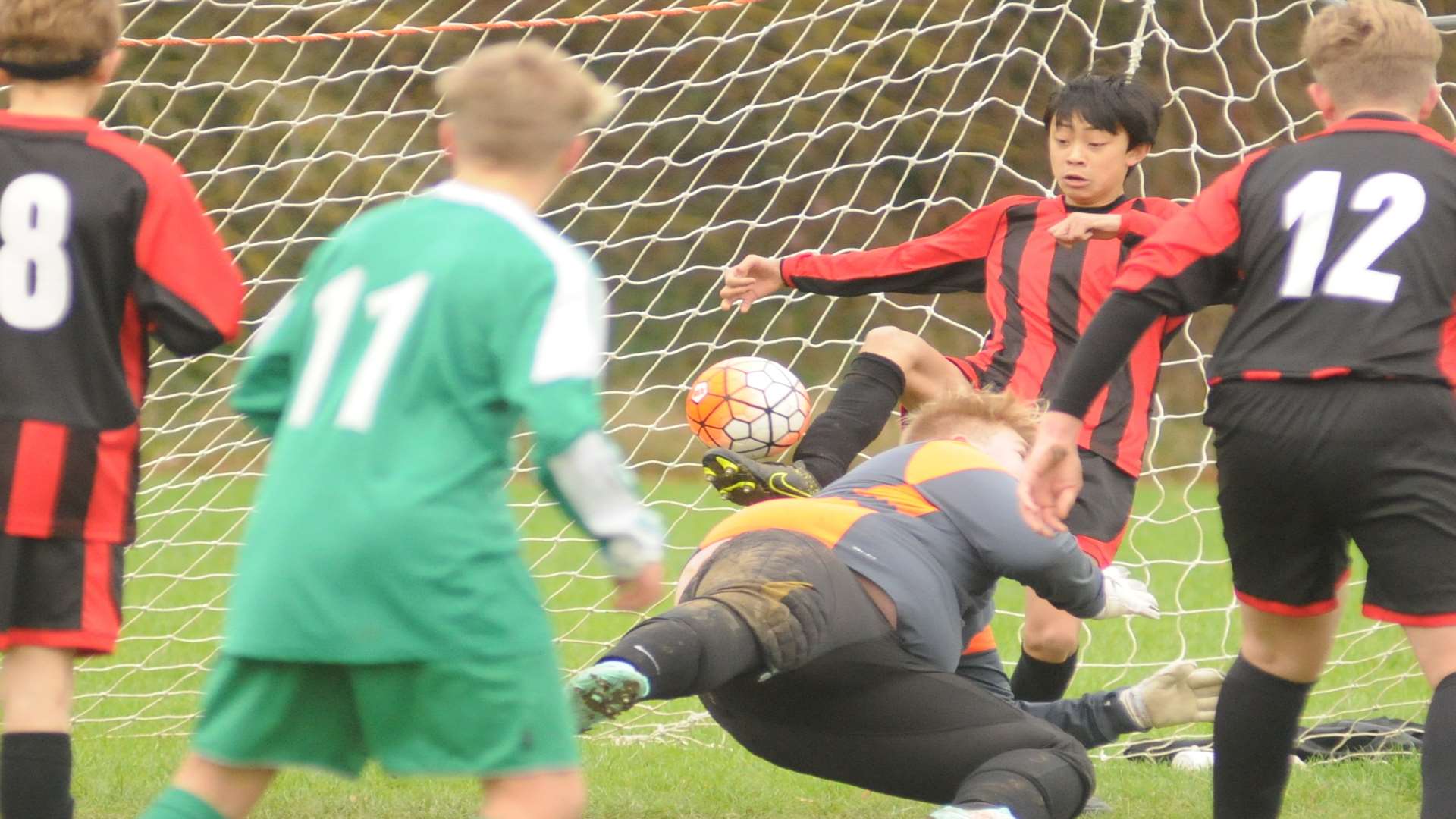 Goalmouth action as Meopham Colts Black and Eagles chase Under-14 Division 2 points Picture: Steve Crispe