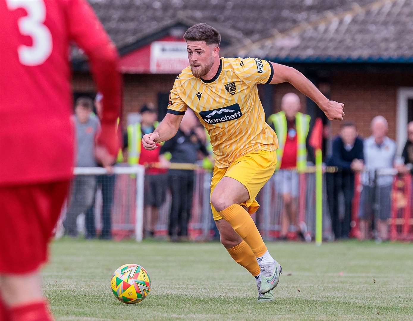 Sam Bone brings the ball through midfield during Maidstone’s FA Cup win at Winchester. Picture: Helen Cooper
