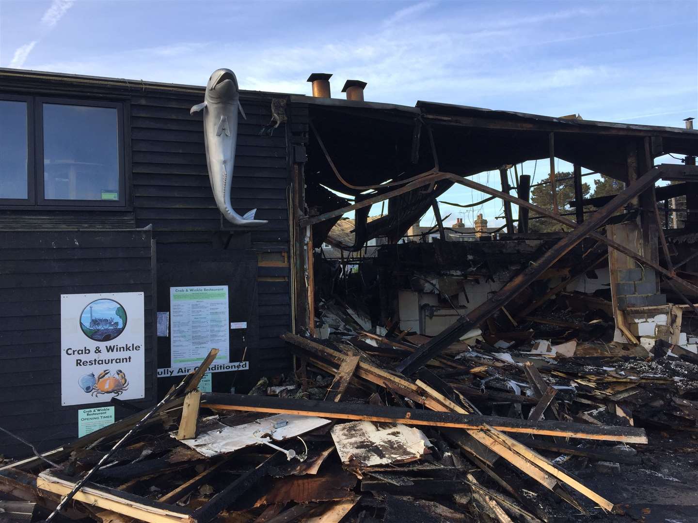 The aftermath of the cockle shed fire at Whitstable Harbour