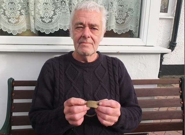 Chris Hammond has been reunited with his father's war ID, 70 years after it was lost